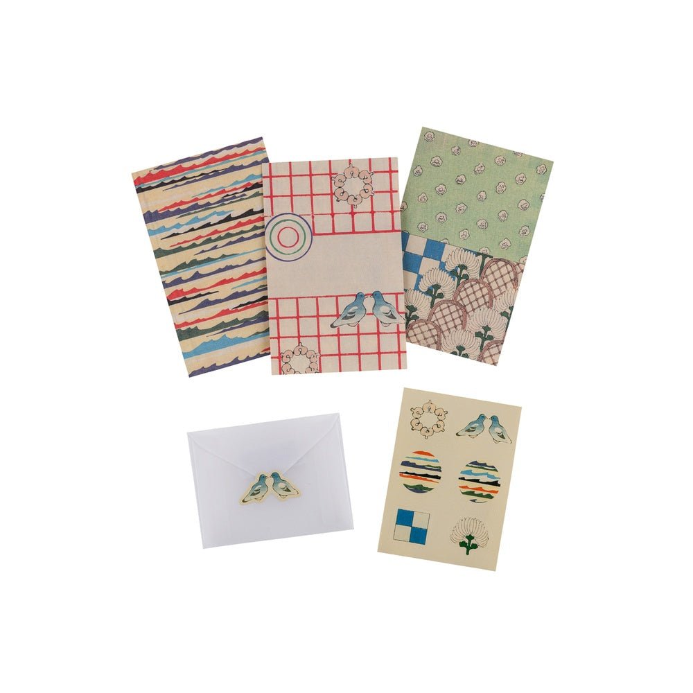 Unsodo mini letter set with papers, an envelope, and sticker seals on white background