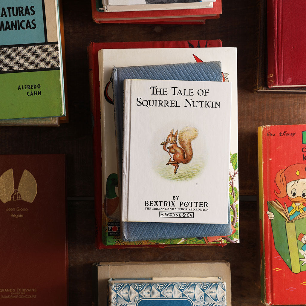 Collection of notebooks made out of hardcover vintage books