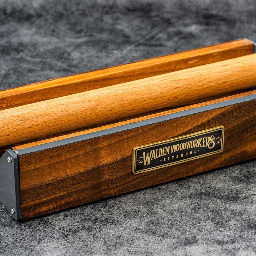 Large wooden washi tape dispenser on dark background