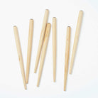 Set of wooden nib holders on a white background