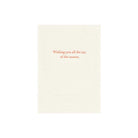 The interior of a greeting card with the words "Wishing you all the joy of the season."