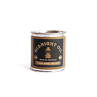 Candle tin labeled 'Midnight Oil' by Bradley Mountain on a white background